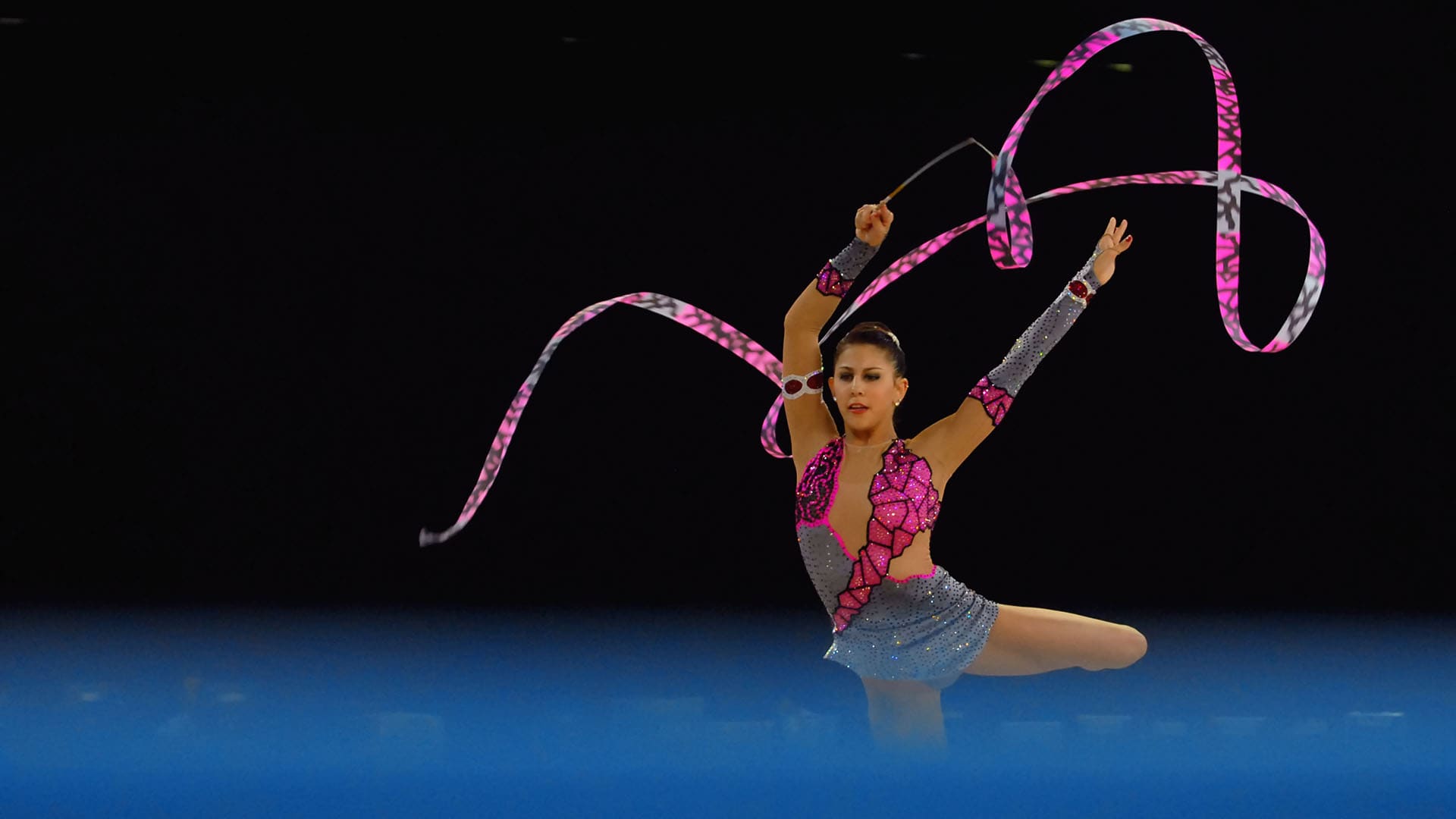 Synchronized Grace: Unveiling the Beauty of Rhythmic Gymnastics